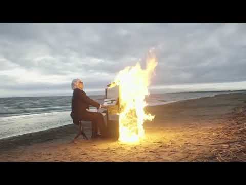 Man plays fire wii party delivery duel music