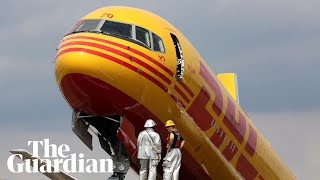 Incredible escape: DHL plane crashes skids off run