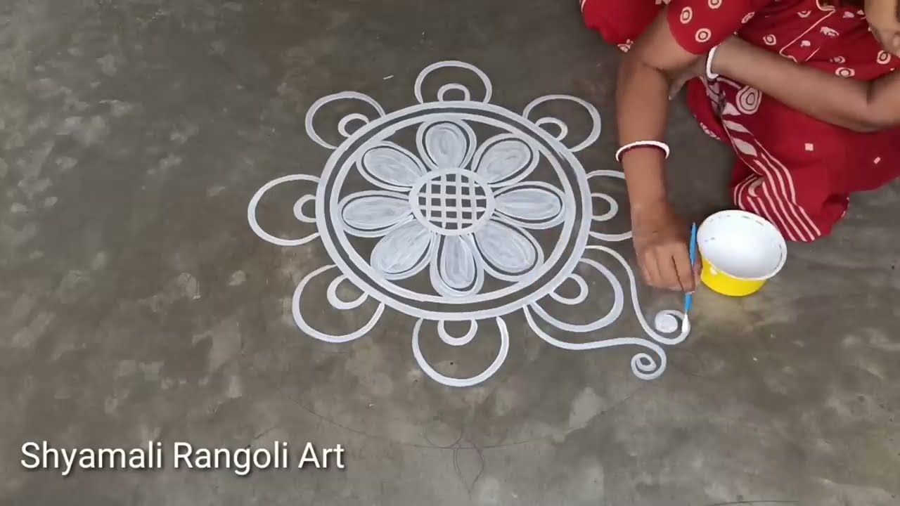beautiul alpana rangoli design for laxmi puja by shyamali rangoli art
