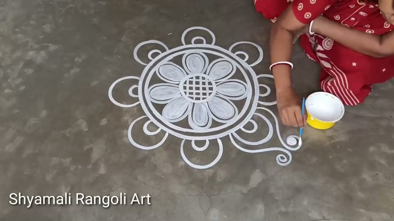 Beautiul alpana rangoli design for laxmi puja by shyamali