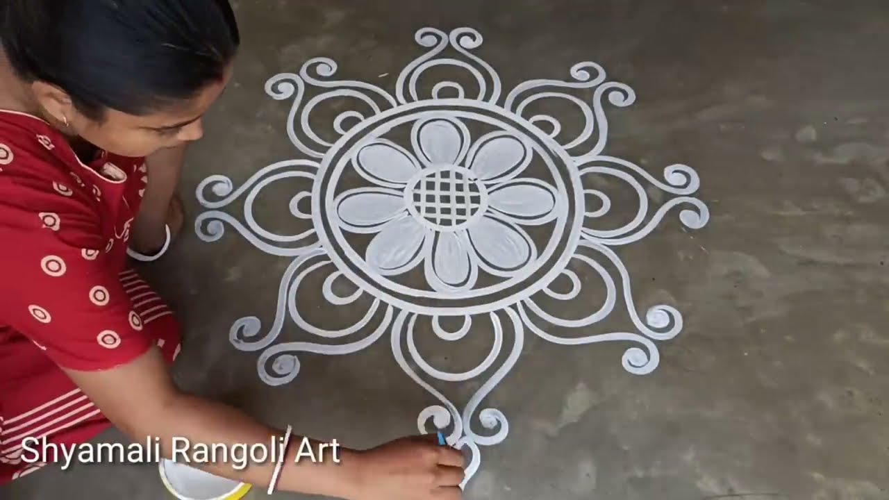 Beautiul alpana rangoli design for laxmi puja by shyamali
