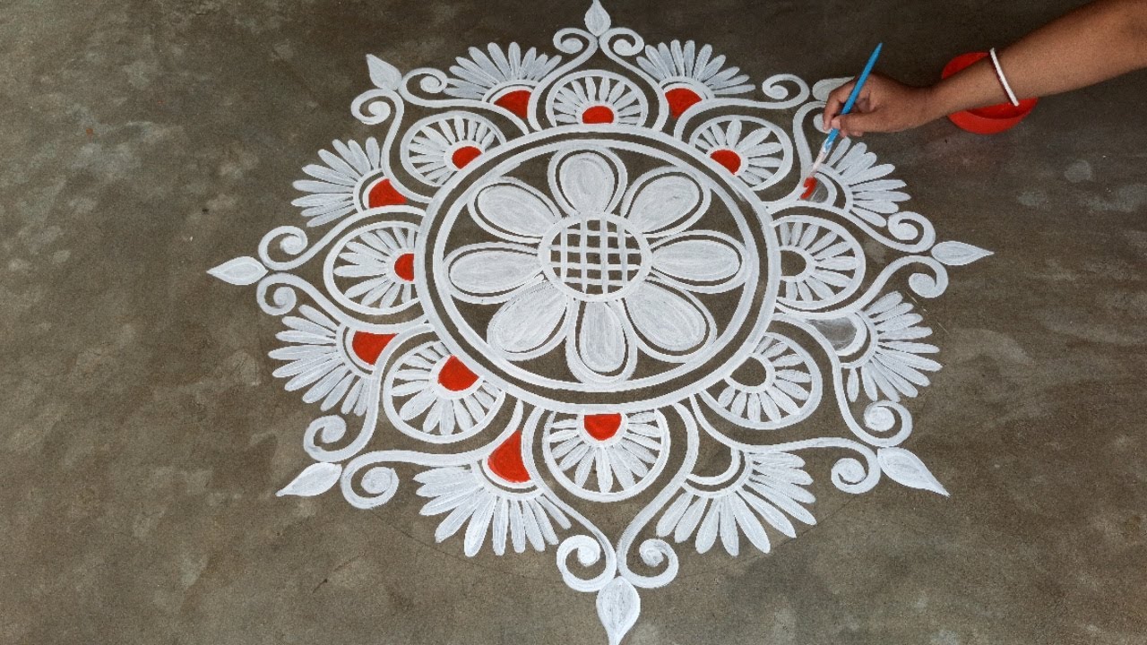 Beautiul alpana rangoli design for laxmi puja by shyamali rangoli art
