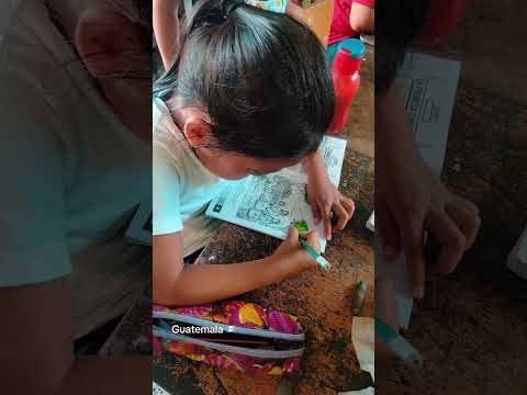Children in school learning and coloring our Bible Books in Río Tarro, Suchitepequez, Guatemala 🇬🇹
