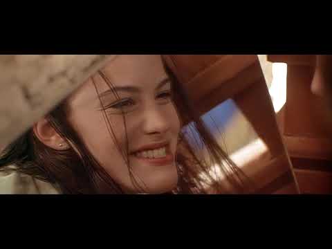 Stealing Beauty trailer frame of Liv Tyler arriving in sunlit Tuscany