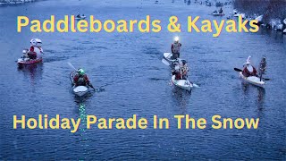 Paddleboards & Kayaks Holiday Parade In The Snow
