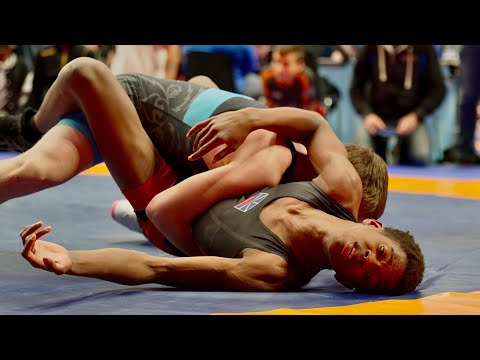 U15 T. Maanfou (FRA) vs L. Uhde (SUI). Freestyle 57kg youth wrestling.
