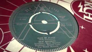 skip bifferty man in black