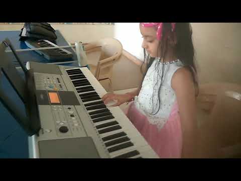 Little girl Kashish playing happy birthday song
