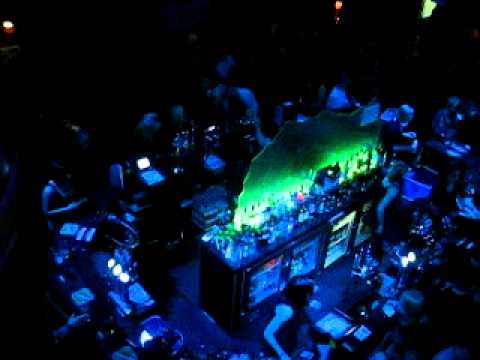 on the balcony of the bar