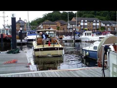 How to dock a single-engine inboard/outdrive boat stern-first
