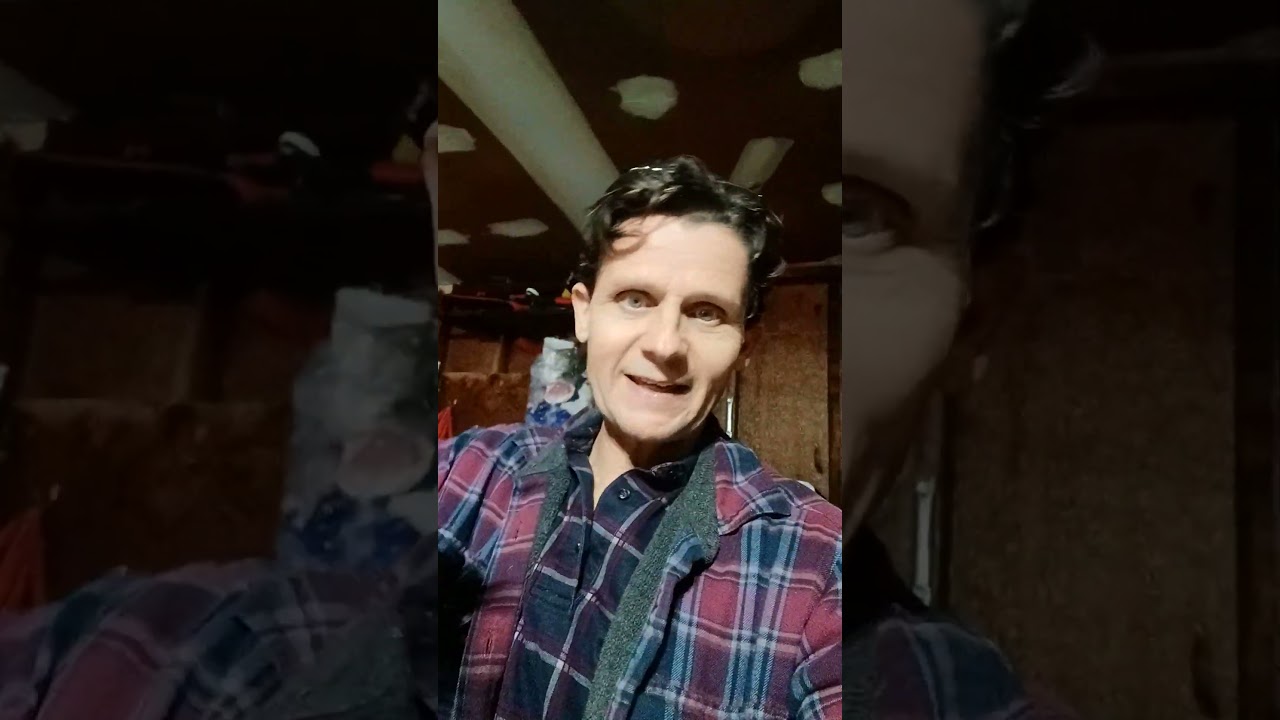 Structural inspection of garage door beam settlement, repairs needed.