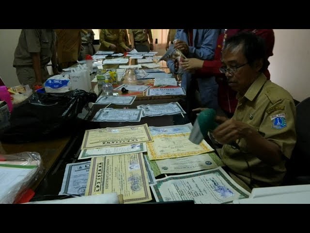 Pelayanan Restorasi Arsip Bagi Warga Terdampak Banjir