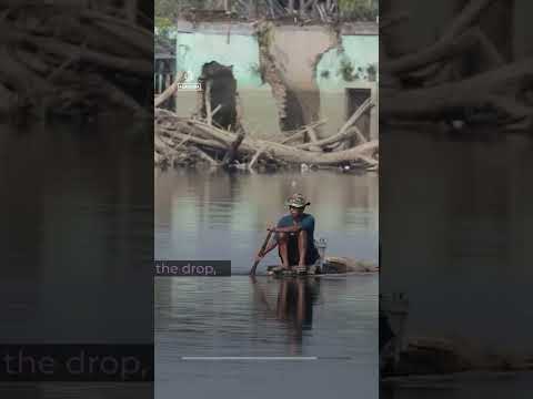 Submerged Indonesian village re-emerges as drought lowers water levels