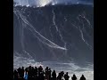 Guy Surfing 100 Foot Tall Wave