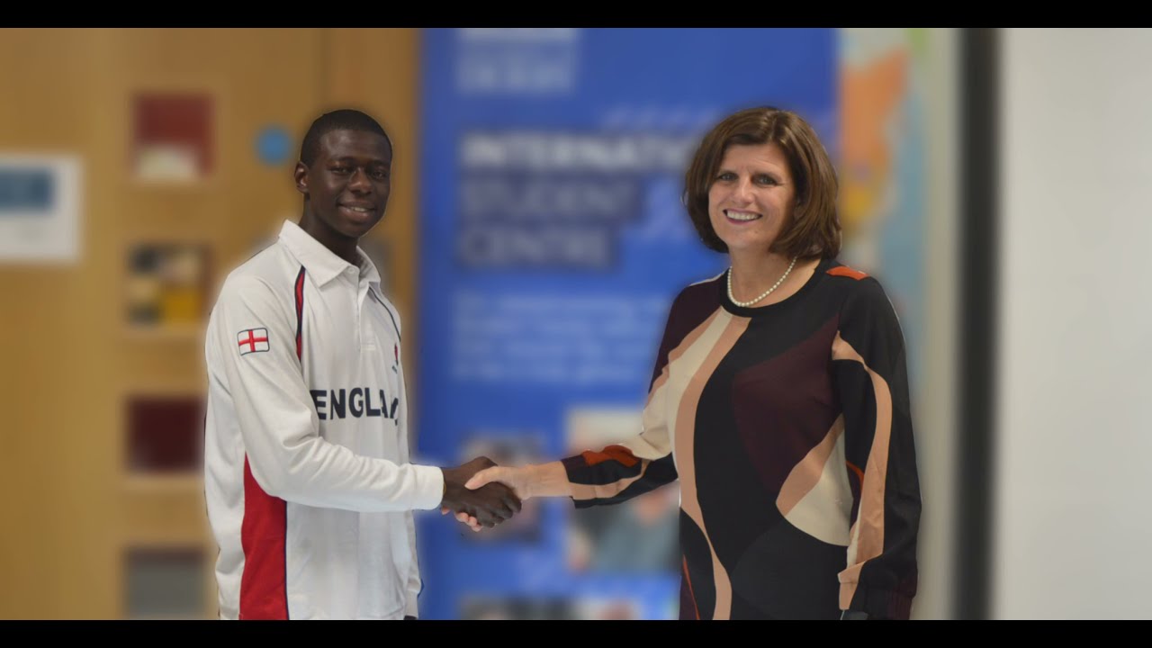 Sam Chikowore from Zimbabwe with University of Derby Vice-Chancellor Dr Kathryn Mitchell