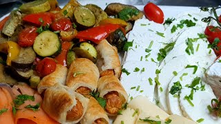 מגש משגע עם ירקות אנטיפסטי מוגש עם גבינות Antipasti vegetable tray in the oven served with cheeses (ליהי קרויץ - מטבח בקלי קלות) - התמונה מוצגת ישירות מתוך אתר האינטרנט יוטיוב. זכויות היוצרים בתמונה שייכות ליוצרה. קישור קרדיט למקור התוכן נמצא בתוך דף הסרטון