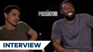 The Predator's Augusto Aguilera & Trevante Rhodes Joke About Predator's Evolution | TIFF 2018 video