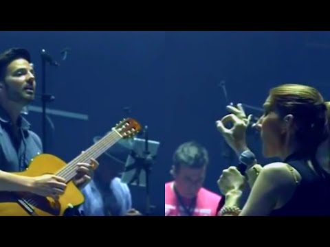 Celine Dion instructing a guitar with her voice