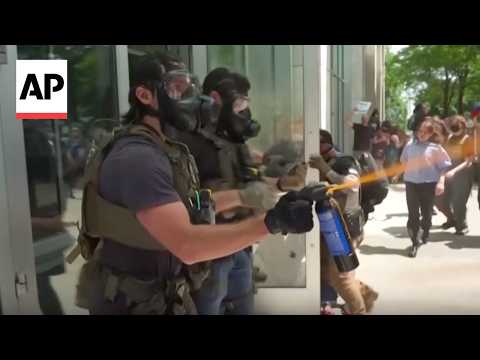 US Marshals pepper spray protesters in clash in St. Paul, Minnesota