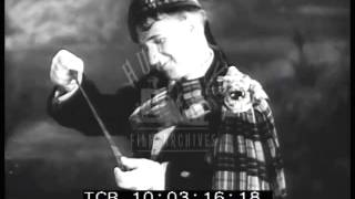 Harry Lauder sings Roamin' in the Gloamin' in 1931.  Film 91565