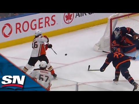 Trevor Zegras Banks Puck Off Mike Smith's Back To Score From Sharp Angle