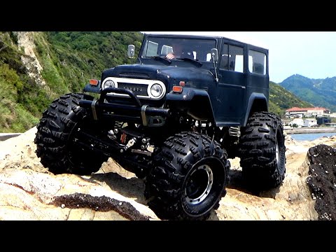 TAMIYA CR-01 LAND CRUISER 40 ROCK CRAWLING WITH COMPETITION TIRES IN SEA SIDE ROCKY PLACE