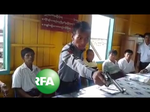 Gun-waving police officer goes viral in Myanmar
