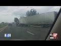 Funnel cloud lifts semi-truck