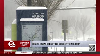 Heavy snow impacts residents in Akron