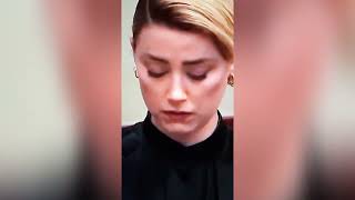 Amber Heard being so fake! Trying to make herself cry while listening to a recording in court...