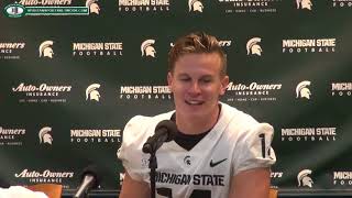 Brian Lewerke on podium