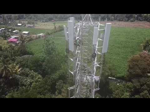 Drone flying on telco tower