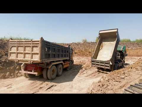 New area Cat 385C Excavator Loading Cat 773 & 775 Dumpers On A Highway Project Sotiriadis.