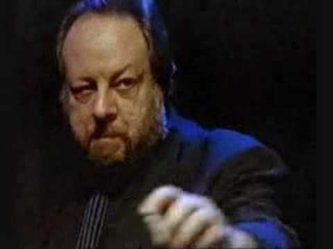 Ricky Jay slices a pencil with a playing card