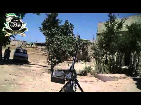 تقرير مرئي يوثق استهداف حاجز الملوك في مدينة تلبيسة في حمص بواسطة المدافع والرشاشات الثقيلة من قبل كتائب الفاروق