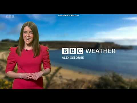 Alex Osbourne the weather presenter on BBC Spotlight in a pink dress