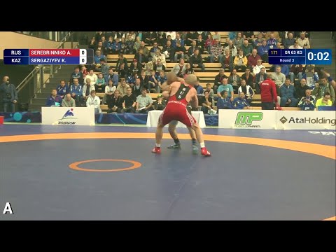 Round 3 GR - 63 kg: A. SEREBRINNIKO (RUS) df. K. SERGAZIYEV (KAZ) by Injury Default, 6-0