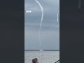 Storms caused a huge, mesmerising waterspout in South Carolina. #BBCNews