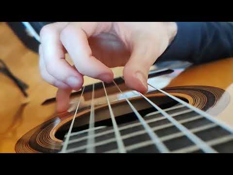 Slow-motion classical guitar without nails
