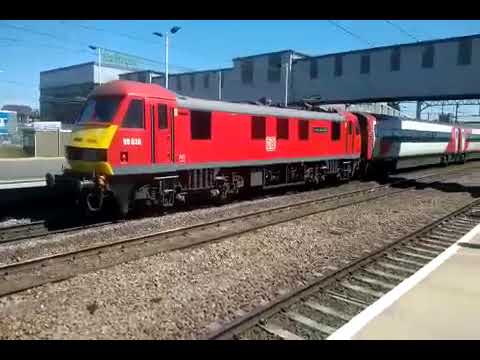 DB red Class 90036 Driver Jack Mills at Peterborough station.