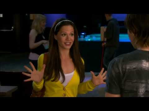 Spectacular! trailer still with Nikko and Courtney facing the stage lights at a school showcase