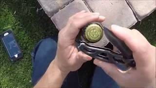 How to open a bottle with a pocket knife