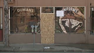 Denver tailor shop owner reels from fire