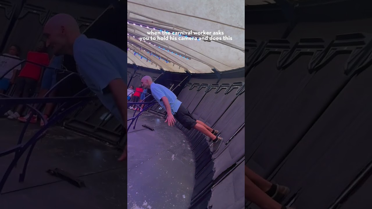 Carnival Worker Does Stunt On Ride