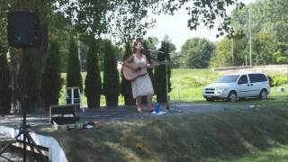 Allison Brown Standing by the bedside of a neighbor