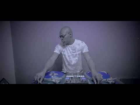 DJ TEE messing around different songs from different genres and countries