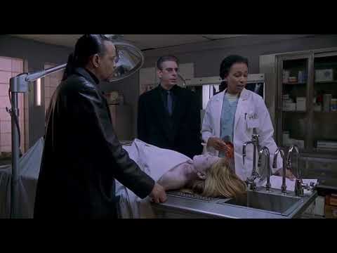 ME Melinda Warner with NYPD’s finest, Munch and Fin