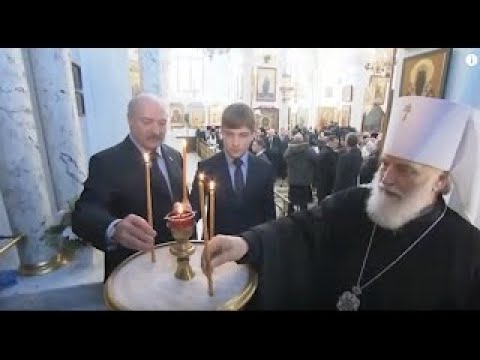 Belarus President Lukashenko and his son Nikolai attend Christmas service in Minsk