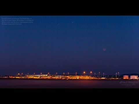 The 2018 Lunar Eclipse Blood Moon sets over Brisbane International Airport, Brisbane, Australia