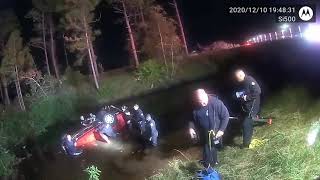 Orlando police officers help firefighters rescue family in submerged vehicle